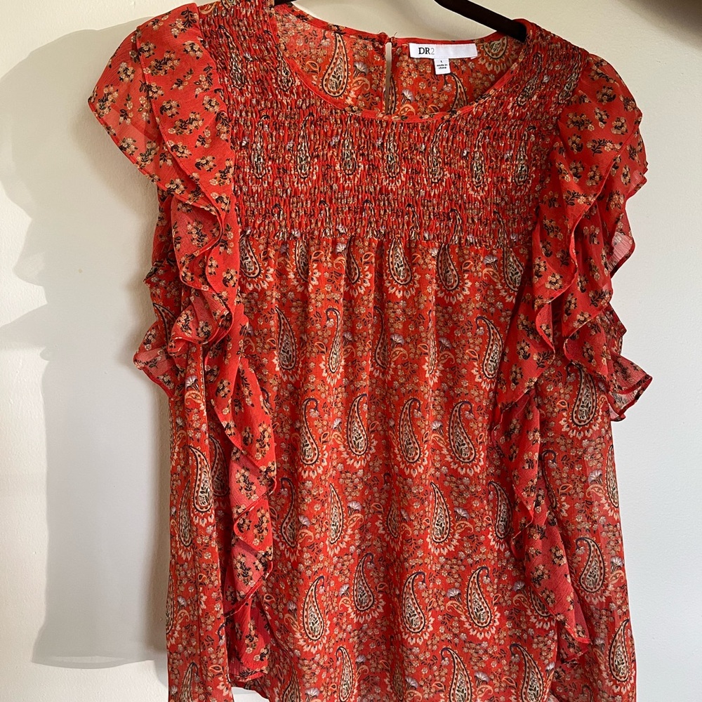 ruffle sleeves, paisley print top with back button closure, loose fitting